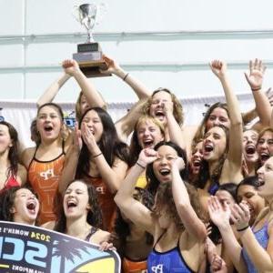 The Pomona-Pitzer women's swim team cheer and raise up the SCIAC trophy.